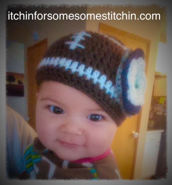 Newborn football beanie with layered flower in Seattle Seahawks team colors by itchinforsomestitchin.com