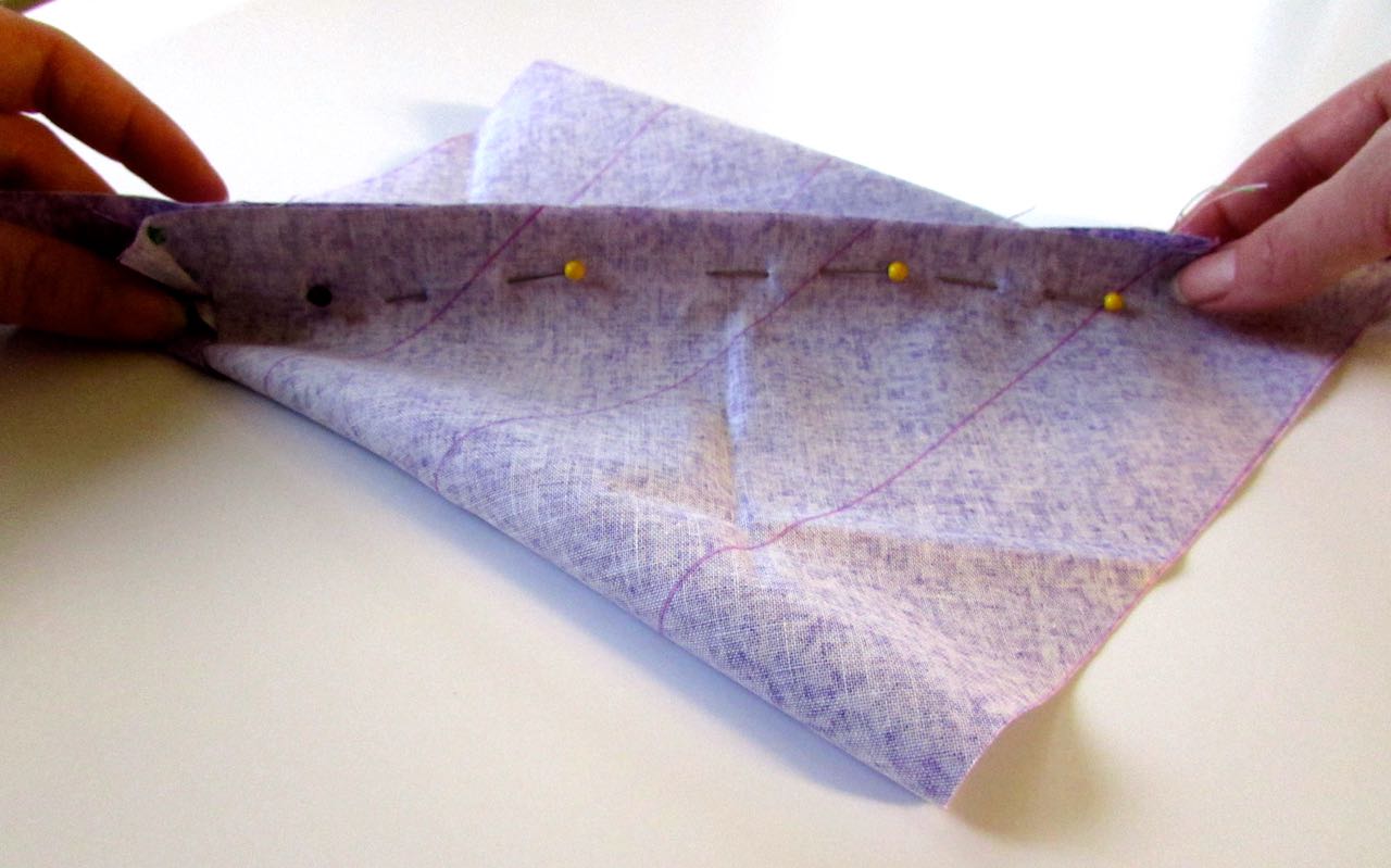 Middle pinned when making continuous bias binding tape by www.itchinforsomestitchin.com