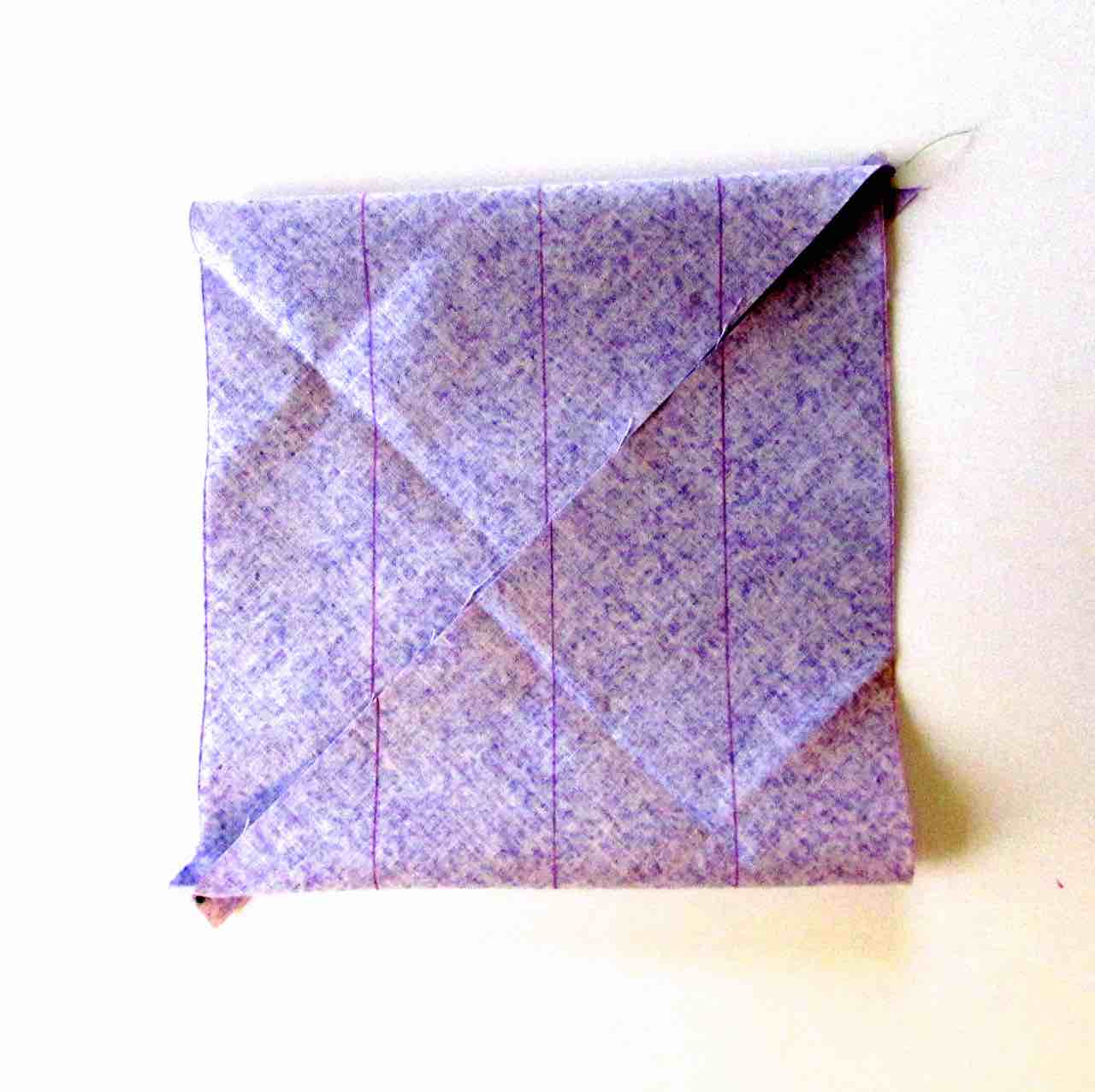 Parallelogram folded when making bias tape by www.itchinforsomestitchin.com