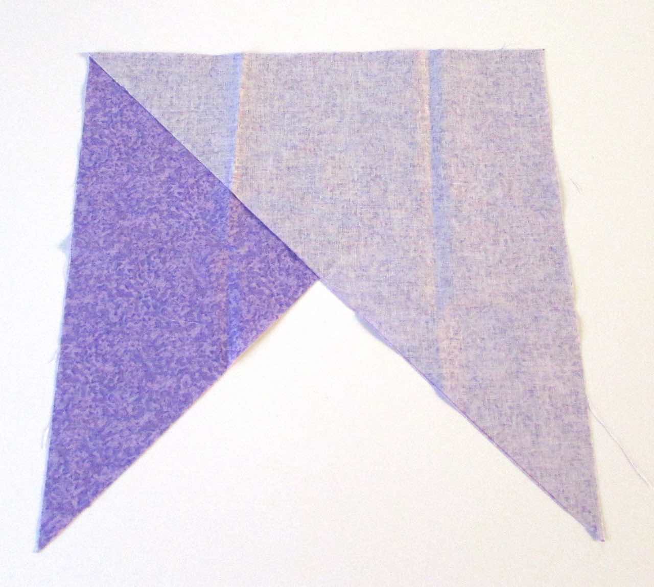 Triangles put together for bias binding by www.itchinforsomestitchin.com