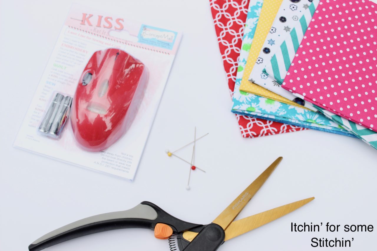 How to cut your fabric perfectly straight with the KISS sewing Laser by www.itchinforsomestitchin.com